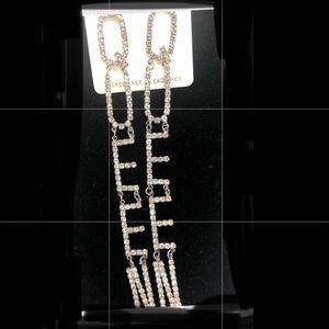 Queen drop earring in gold, post back